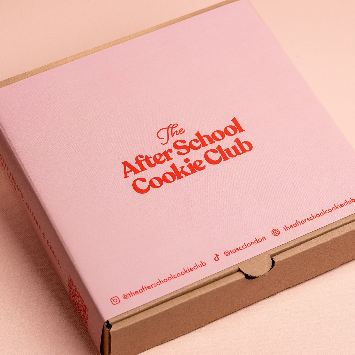 Pink box with 'The After School Cookie Club' text on a pink background