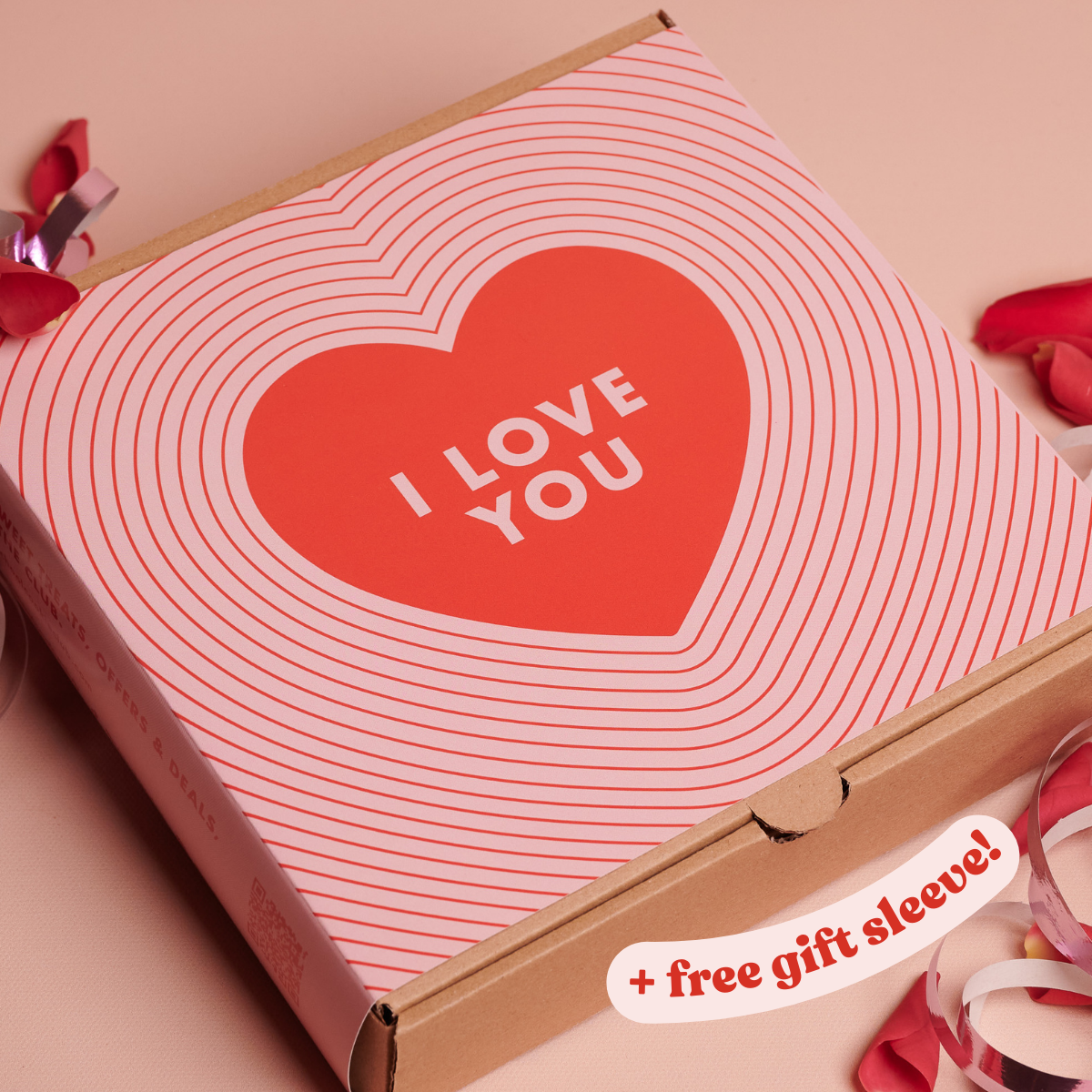 Cardboard box with a heart-shaped design and 'I Love You' text on a pink background.