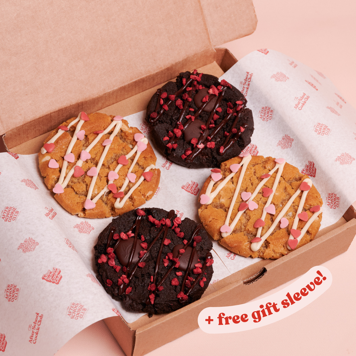 Box of four cookies decorated with heart sprinkles for valentine's day
