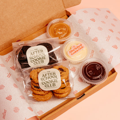 Box of mini cookies with 3 dipping pots on branded paper